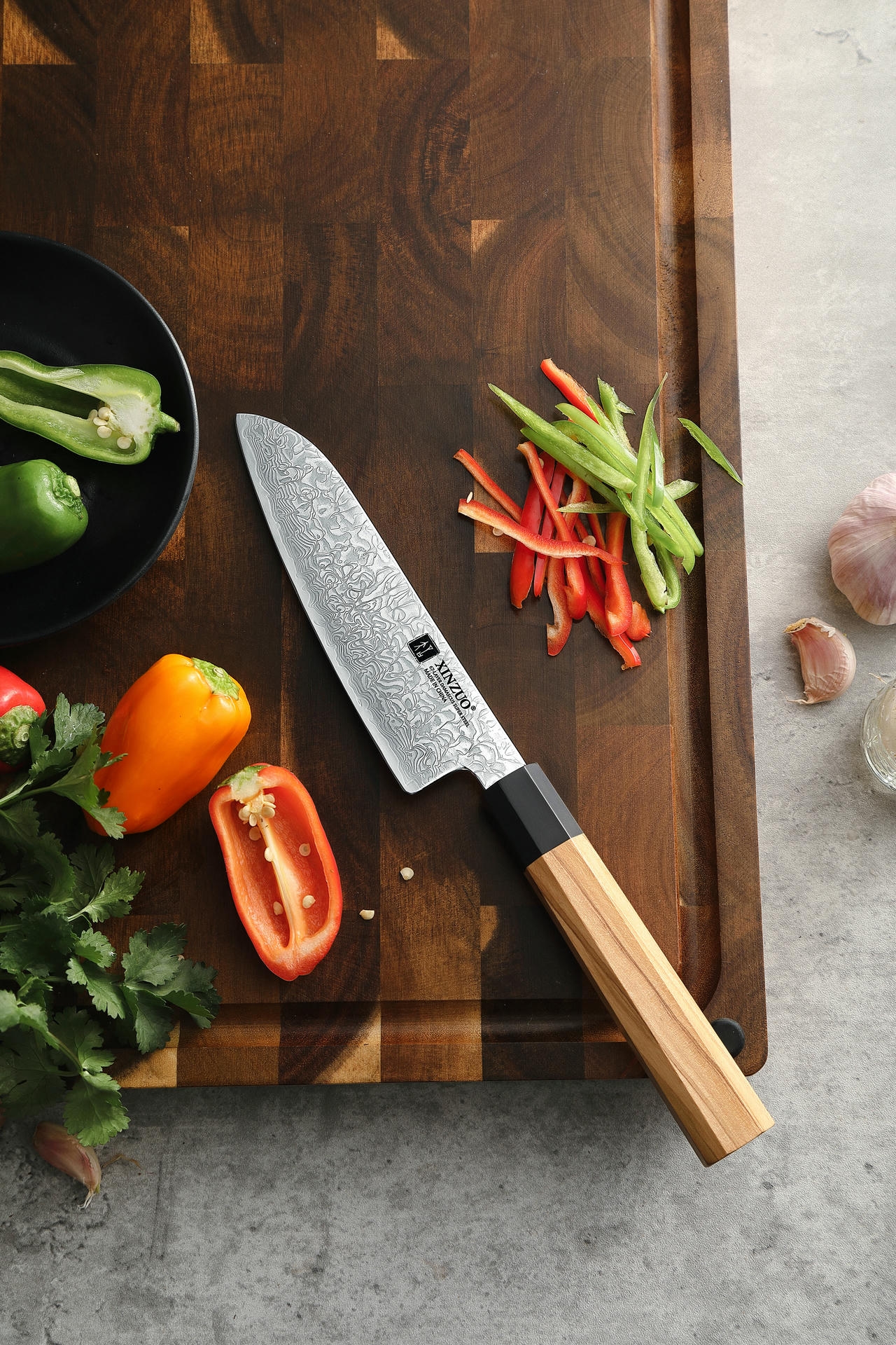 Der Griff des Santokumessers XinZuo Zhen PM8O