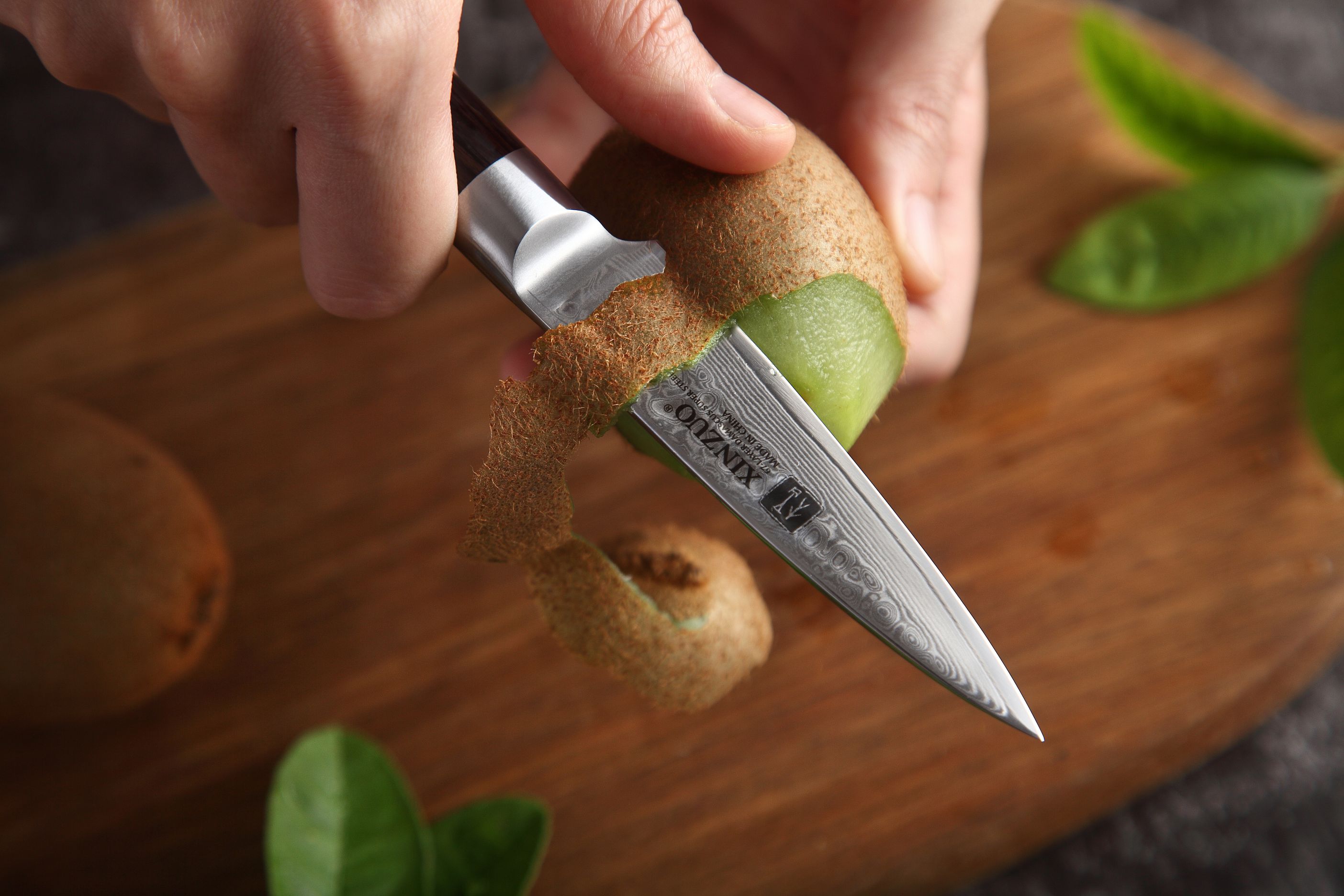 Schälen mit dem Messer XinZuo He B1H