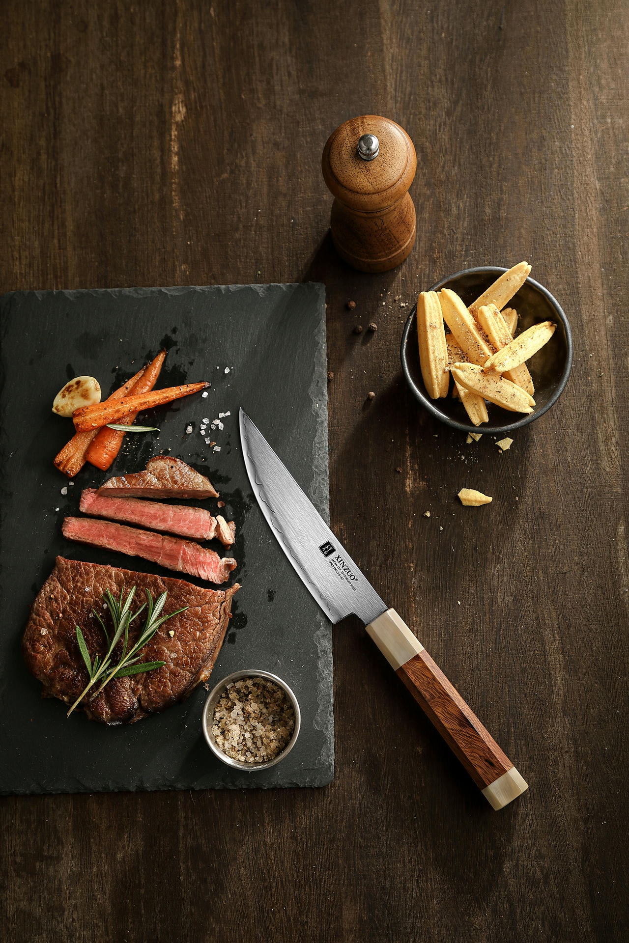 Der Griff des Steakmessers XinZuo Zhen X05Z