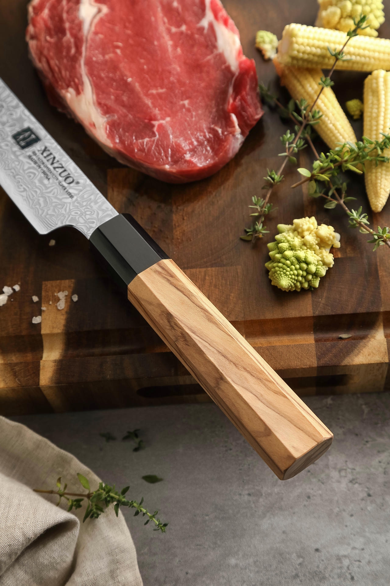 Der Griff des Fleischmessers XinZuo PM8O