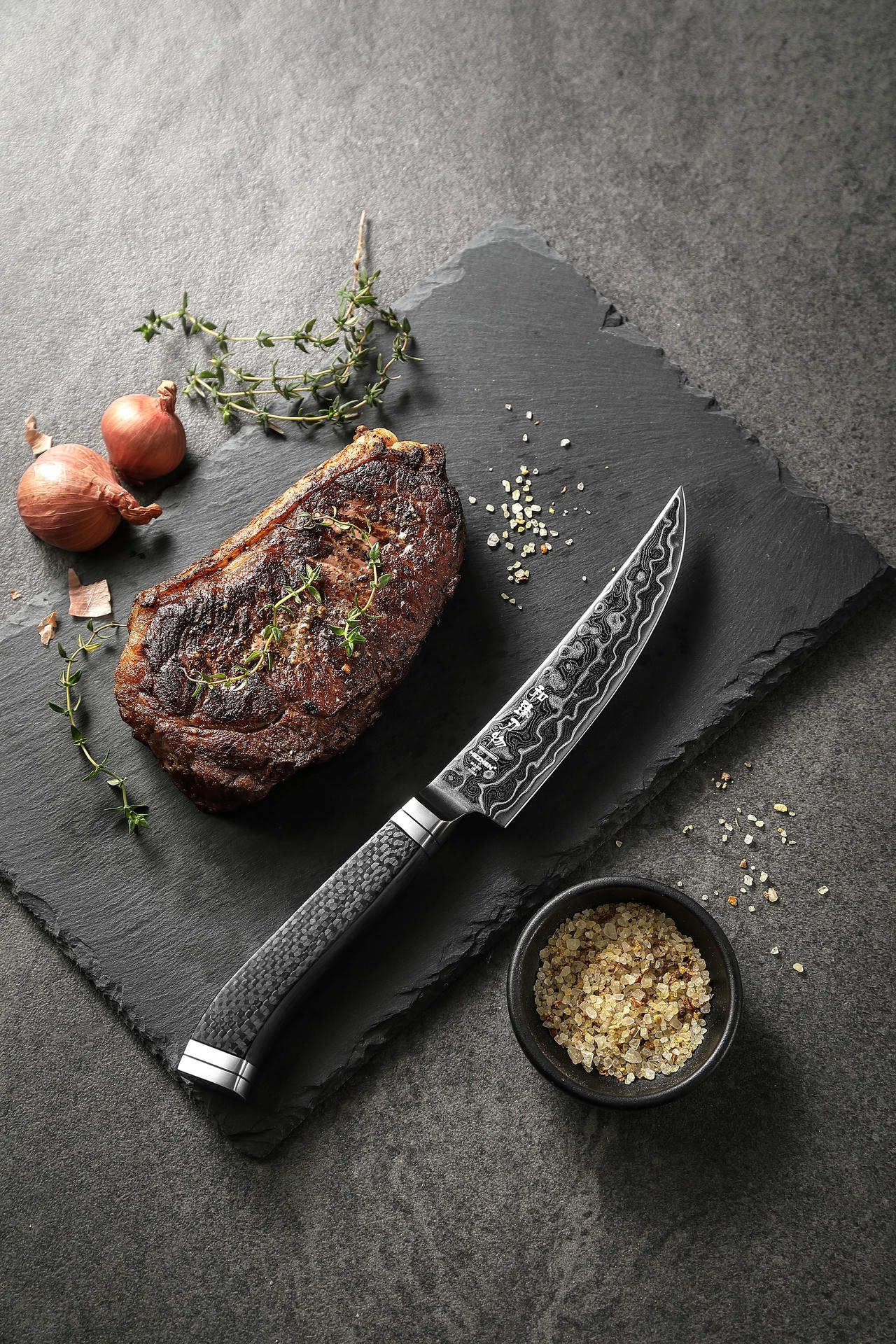 Der Griff des Steakmessers HezHen X10